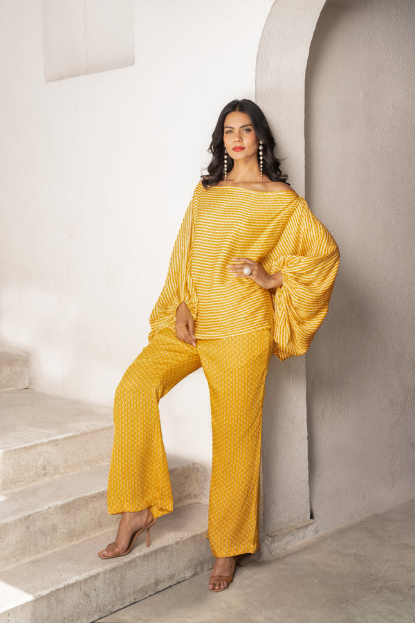 Gulbahar marigold off shoulder balloon sleeve top with pants set.